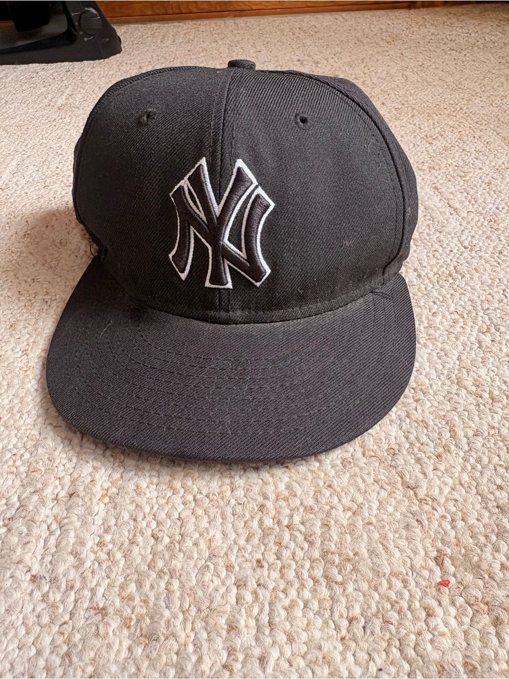 Black New York Yankees Snapback Hat with White Logo